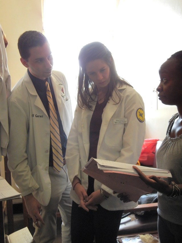 Jeff and Stacy review a chart with Vivian and discuss the drug therapy regimen