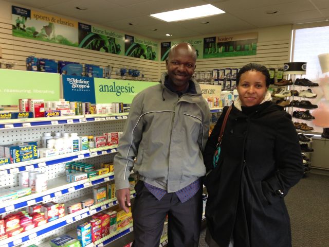 Patrick and Vicky in the aisle of the Medicine Shoppe- Note the coats- besides the "culture shock" there was definitely "cold shock"!