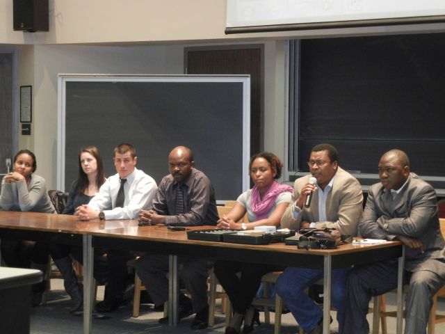 East African Health Care Forum Panel Discussion; Vicky is on the end, Stacy and Nikko are 2 of my students who went to Uganda last October, then Patrick is seated.  The next student went to Tanzania last summer and the 2 Tanzanian Physicians are on the end