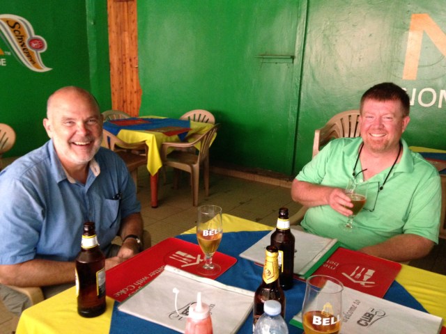 Monty (on left) and Jeff (on right) enjoying a  cold Ugandan brew after a 2 hour worship service at a delicious, and reasonably priced, Indian Restaurant on campus