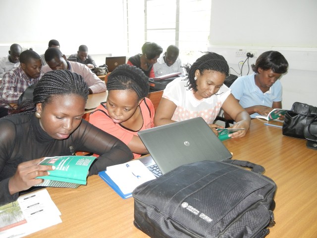 Using the recently donated Sanford's Guide to Antimicrobial Therapy, 4th Year Pharmacy students work on a class exercise