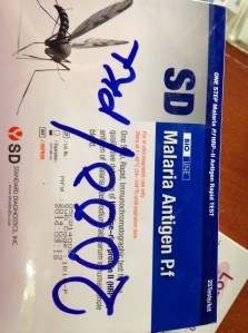 This is a Malaria Rapid Diagnostic Test kit. In a community pharmacy it cost 2000 schillings per test which is about 75 cents in US Dollars- so less than $1