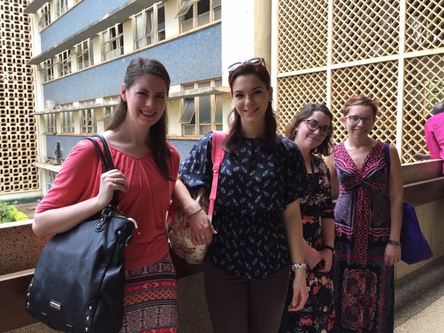 Standing in the hallway overlooking the courtyard at Mulago National Referral Hospital