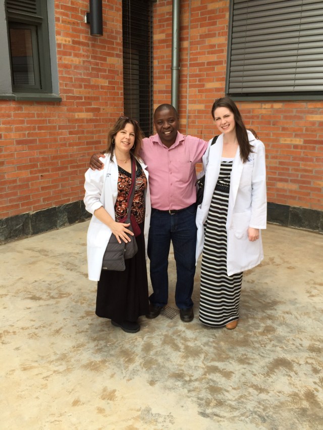 KarenBeth, Benjamin, and Stacy in front of the new Fred Hutchinson Research Center