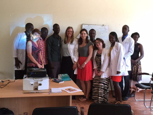 The American Pharmacy crew with many of the Ugandan pharmacy students and interns after the talk
