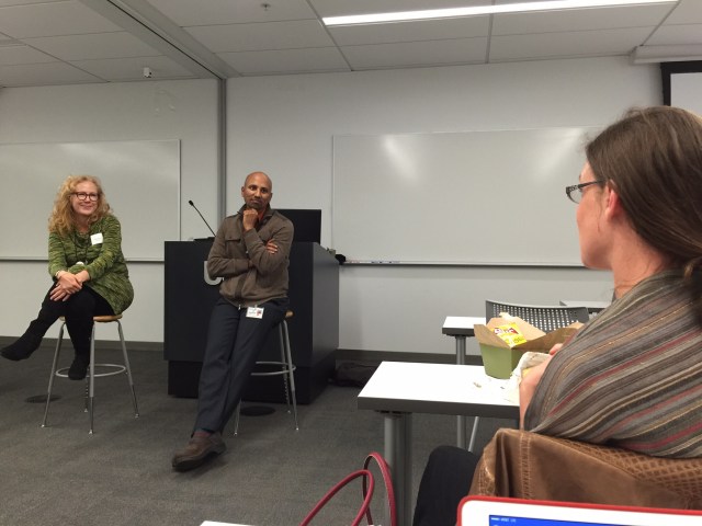 Tina Brock moderates a discussion by Sri, a Global Health Physician at UCSF. Stephanie Lukas, a Pharmacists who recently came back to the USA after spending 2 years in Rwanda is asking a question.